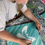 A group of teens exploring art techniques in a workshop