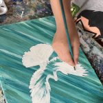 Teen artists experimenting with new art techniques