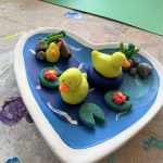 Kids enjoying a polymer clay crafting session